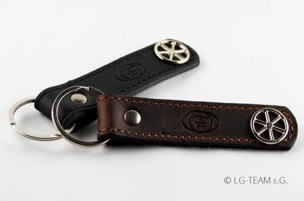 LG Schlüsselanhänger zweifarbig schwarz braun Leder Logo und Glücksrad